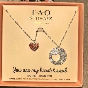 FAO Schwarz Fine Silver Played and Cubic Zirconia Heart Necklace Set